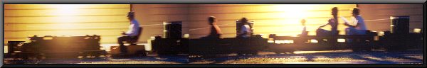 Walt engineer on passenger train during night running.
